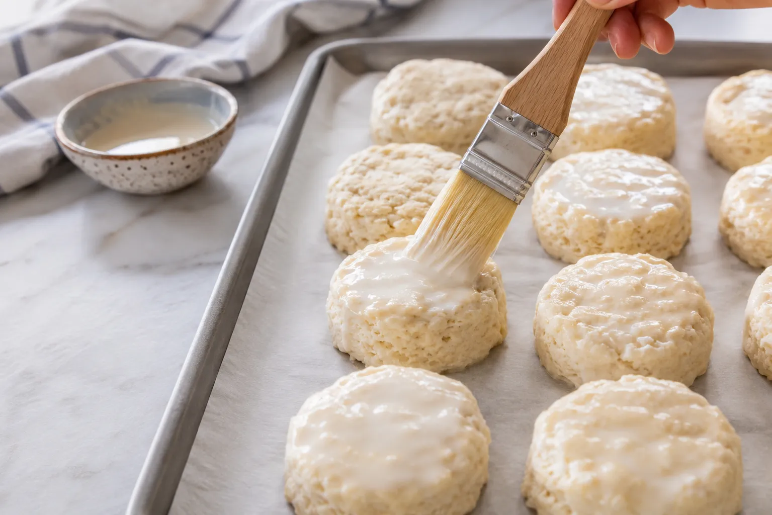 Brushing tops with cream